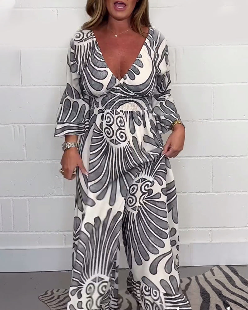 Myla | Loose Jumpsuit with Deep V-Retro Print and Bell Sleeves