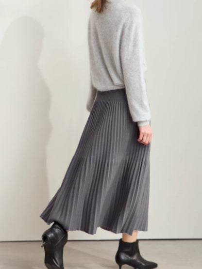 Back side view of gray pleated midi skirt with color-block detail