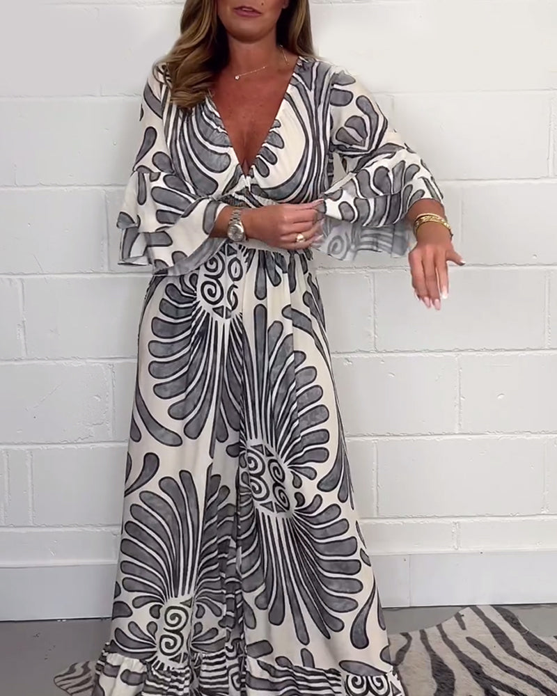 Myla | Loose Jumpsuit with Deep V-Retro Print and Bell Sleeves