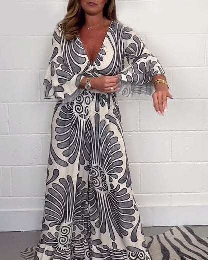 Myla | Loose Jumpsuit with Deep V-Retro Print and Bell Sleeves