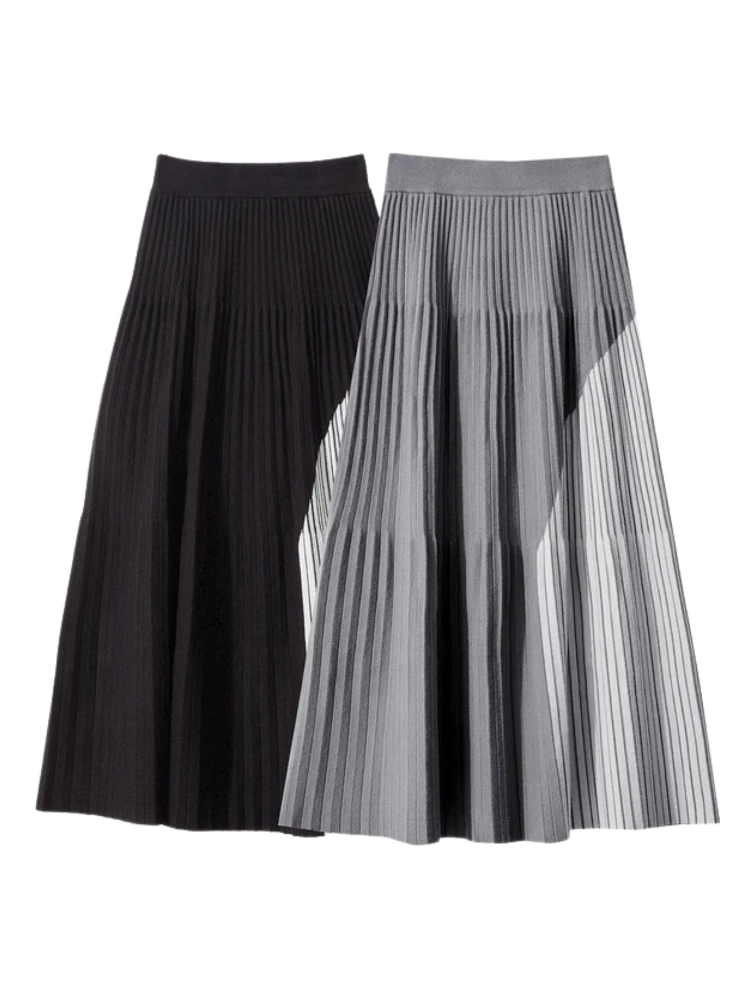 Flat lay of black and gray pleated midi skirts with asymmetrical color-block panels